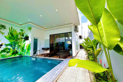 z5866673491121 aed5b358353ec9c385c26218efaa8080 Spacious 5BR Pool Villa in Nam Viet A: Your Tranquil Urban Oasis